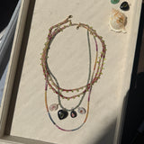 THE ELLE BRIOLETTE NECKLACE IN ANDESINE AND PERIDOT