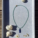 LAPIS FISH NECKLACE ON APATITE