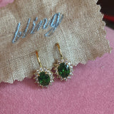Princess emerald earring with halo