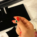 Princess emerald earring with halo