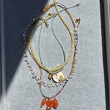 SEASIDE ORANGE NAUTILUS CHARM