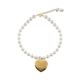 THE MV SIGNATURE LARGE HEART PENDANT NECKLACE IN GOLD